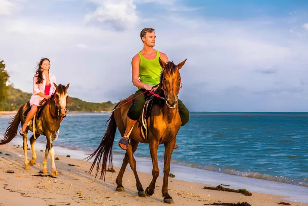 horseback-riding-by-macao-beach-and-crystal-clear-river-2209767.webp